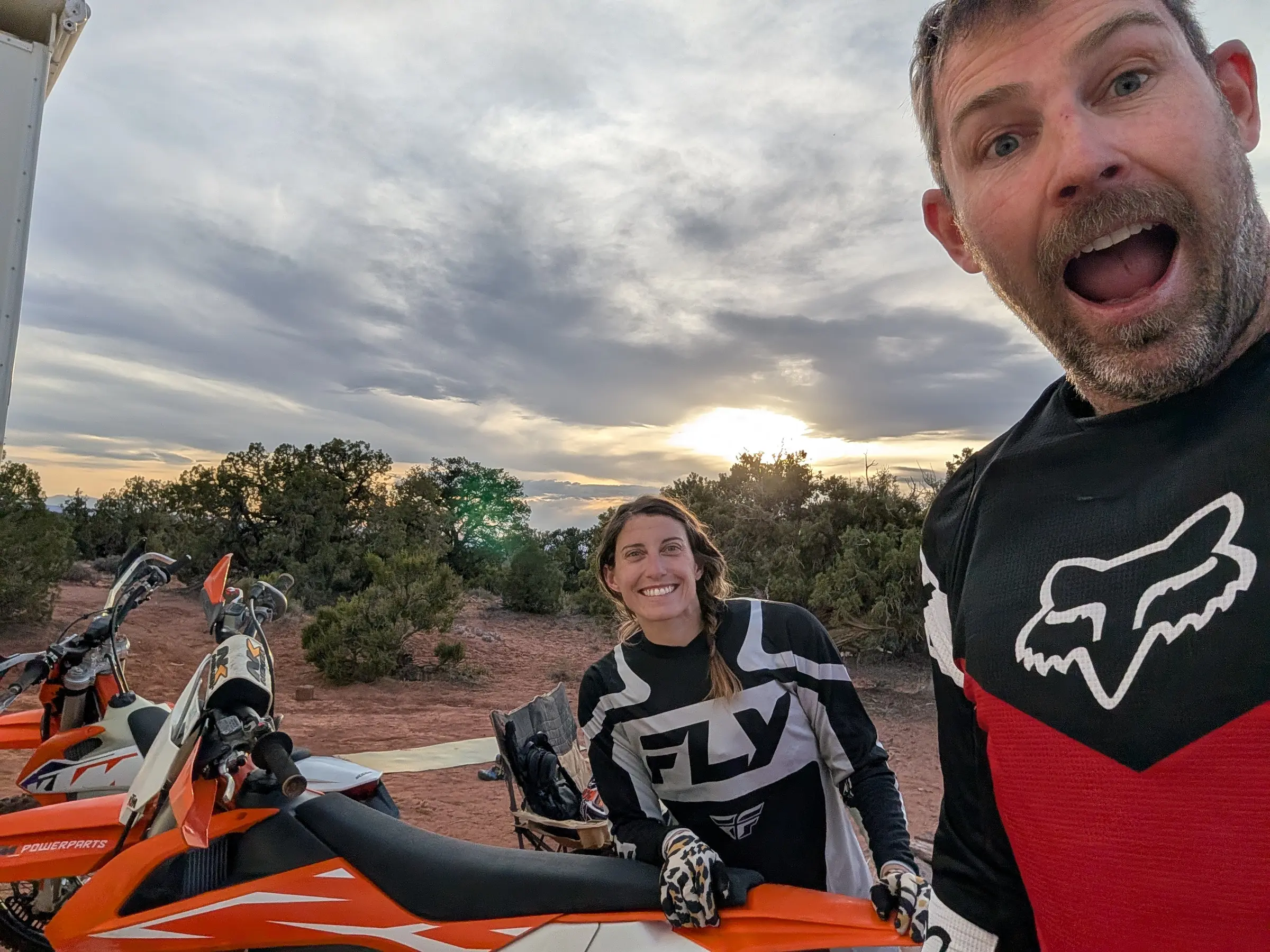 Dirt bikes at a desert sunset
